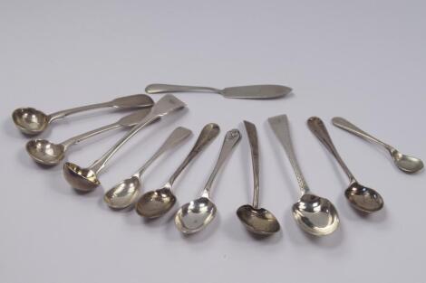 A collection of Georgian and later silver condiment spoons