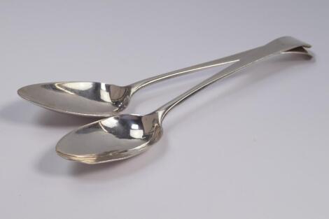 A pair of George III silver serving spoons