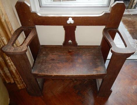 An oak hall seat/stick stand.