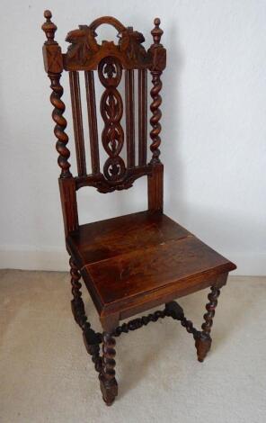 A carved oak single chair