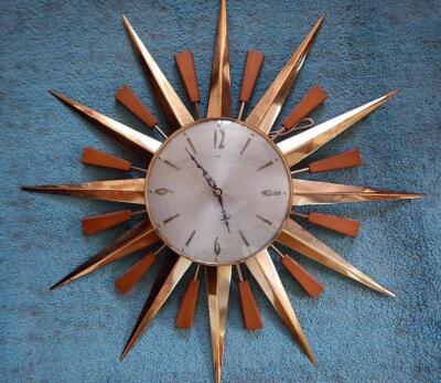 A 1960s Metamec sunburst wall clock.