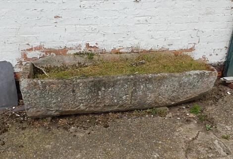 A large stone trough