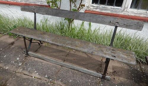 A wooden garden bench seat