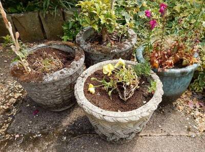 Three reconstituted stone planters