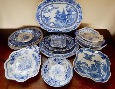 A collection of 19thC and later blue and white transfer printed dishes.