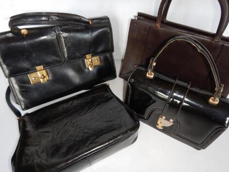 Four ladies leather handbags.