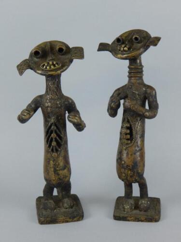 Tribal Art. A pair of African male and female bronze figures