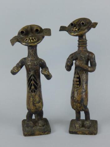 Tribal Art. A pair of African male and female bronze figures