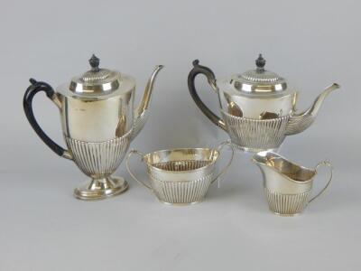 A George V silver part fluted tea and coffee service