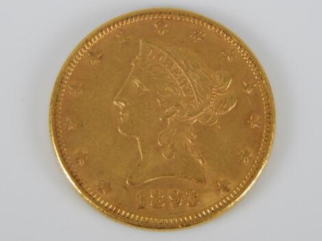 A gold USA ten dollar coin