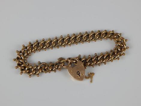 A 9ct gold charm bracelet