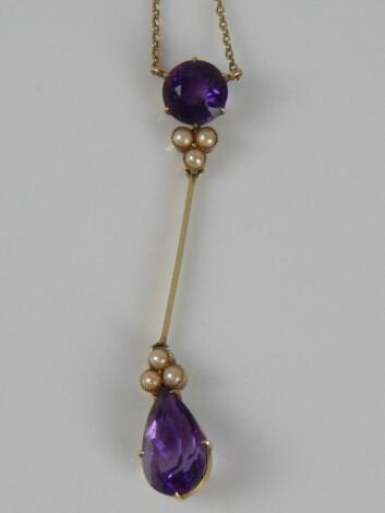 An amethyst and seed pearl drop necklace