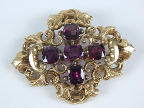 A Victorian large amethyst set ornate brooch