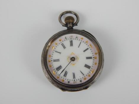 A silver fob watch