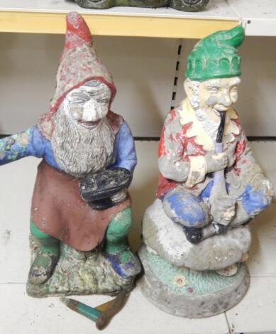 Two similar painted composition garden gnomes