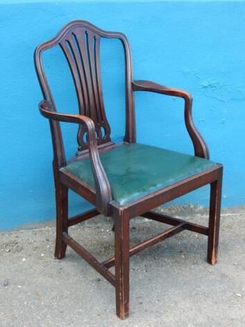 A mahogany open armchair in George III style