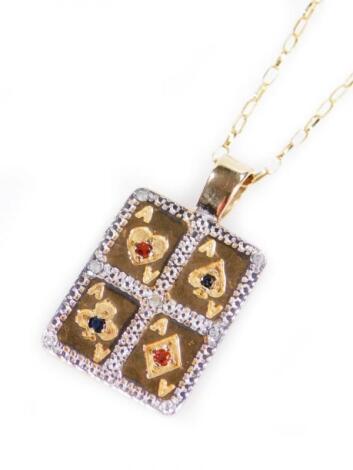 A 9ct gold playing card pendant