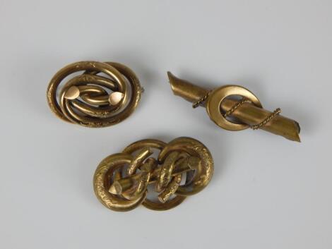 Three brooches