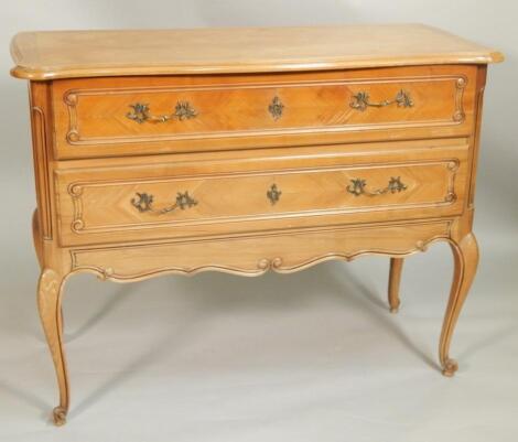 A reproduction French cherrywood desk