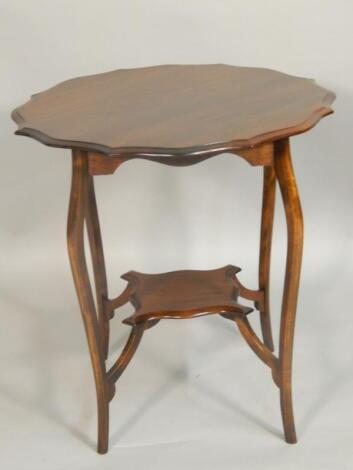 An Edwardian mahogany occasional table