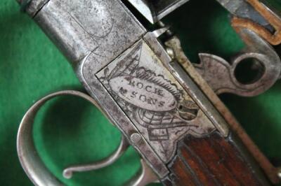 A pair of flintlock muff pistols - 3