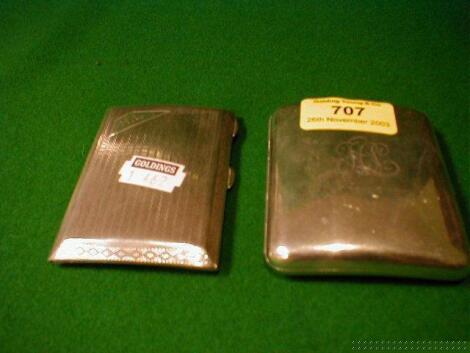 Two silver cigarette cases