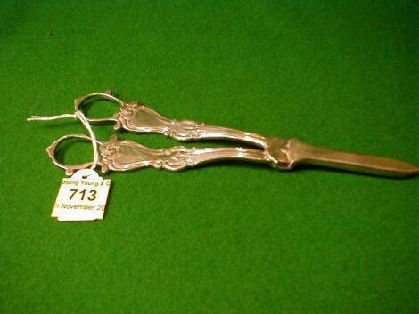 A pair of 19thC white metal grape scissors