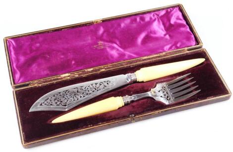 A pair of Edwardian silver plated and ivory fish servers