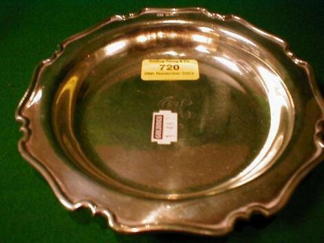 A George V silver coaster with piecrust rim