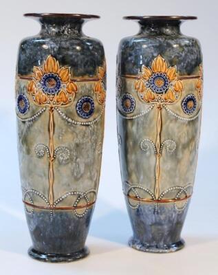 A pair of early 20thC Royal Doulton stoneware vases