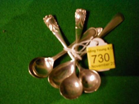 A silver salt spoon and 4 plated examples