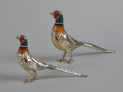 A pair of Continental white metal pheasants