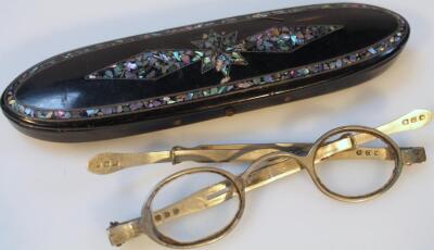 A 19thC papier mache mother of pearl spectacles case