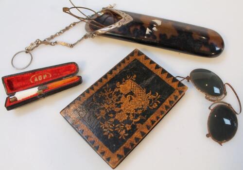 An Edwardian tortoiseshell and silver spectacles case