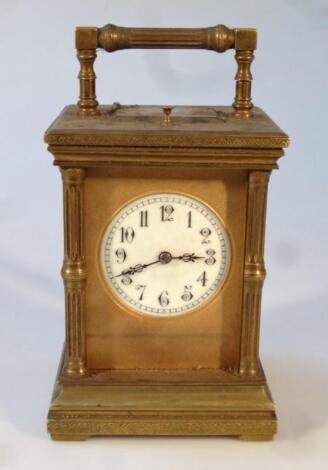 A late 19thC/early 20thC brass carriage set clock