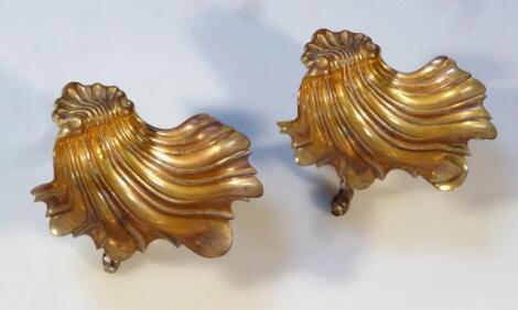 A pair of 19thC gilt metal shell shaped salts