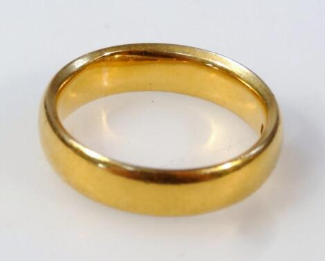 A 22ct gold circular wedding band