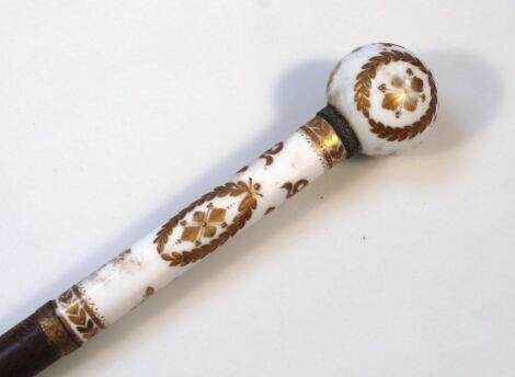 A rare 19thC porcelain walking stick handle