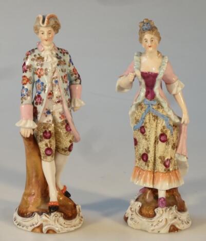 A pair of 20thC Sitzendorf porcelain figures