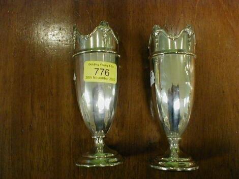 A pair of George V silver vases