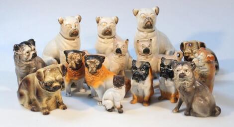 A pair of 19thC Staffordshire pottery free standing pug dogs