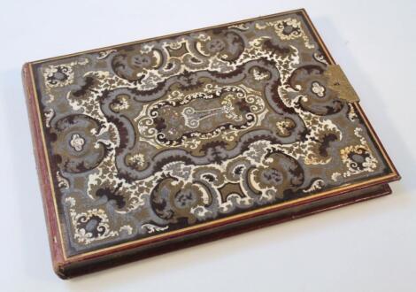 A 19thC bone ivory gilt metal and silvered stencilled and tooled album case