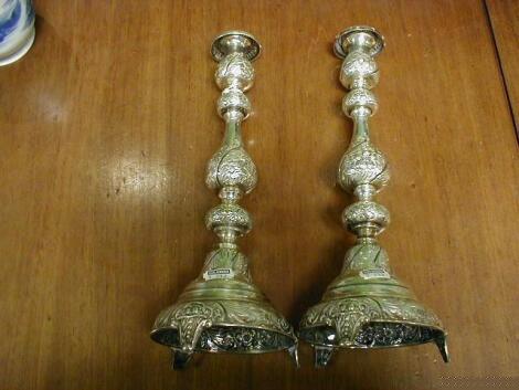 A pair of Goerge V silver candlesticks