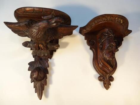 A 20thC Black Forest style hardwood wall sconce