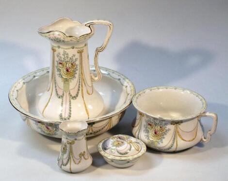 An early 20thC Keeling & Co Hythe pattern dressing table set