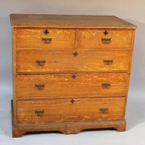 A 19thC painted pine oak effect flat front chest