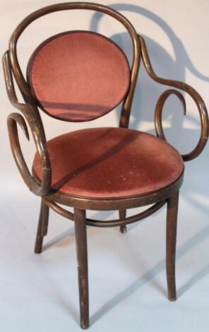 A 1930's stained beech bentwood armchair