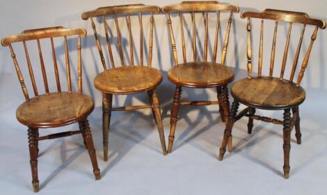 A set of four late 19thC stained ash and elm kitchen chairs