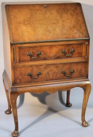 A mid-20thC walnut veneered bureau