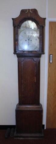 A 19thC oak and mahogany longcase clock